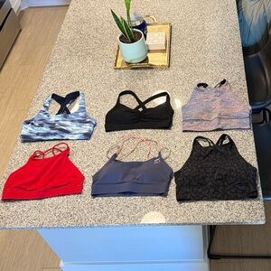 Various sports bras (Lululemon, Peloton, Vuori)